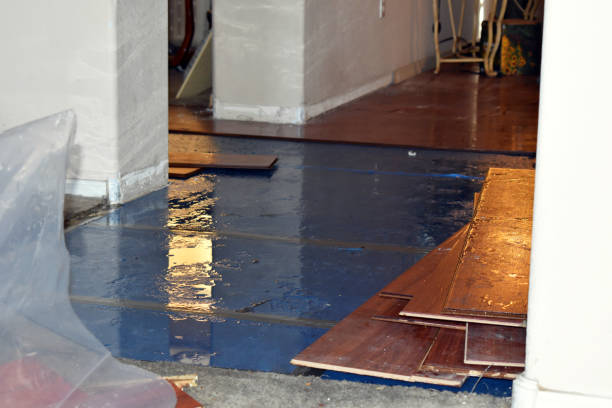 Professional Flood Damage Restoration technician working in Wake Forest, NC